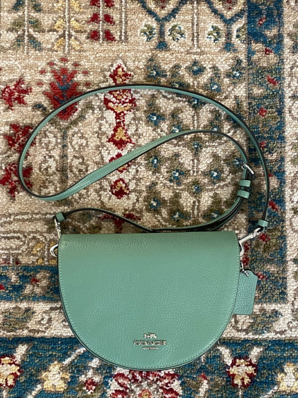 Coach Mint Green Pebbled Leather Saddle Crossbody Bag